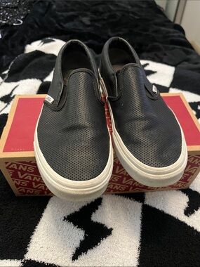 Vans Black Perforated Slip-On Sneakers with White Soles
